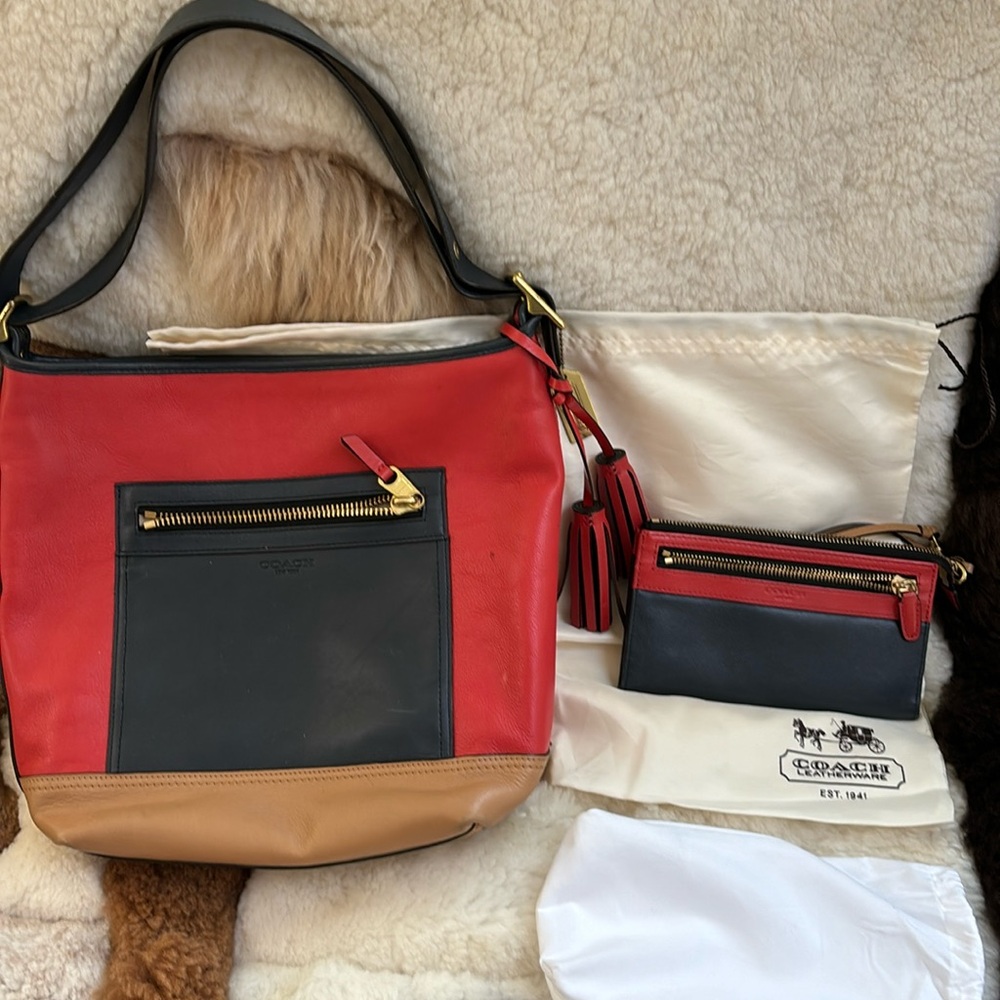 This is a coach purse and matching wallet with bags to go with them